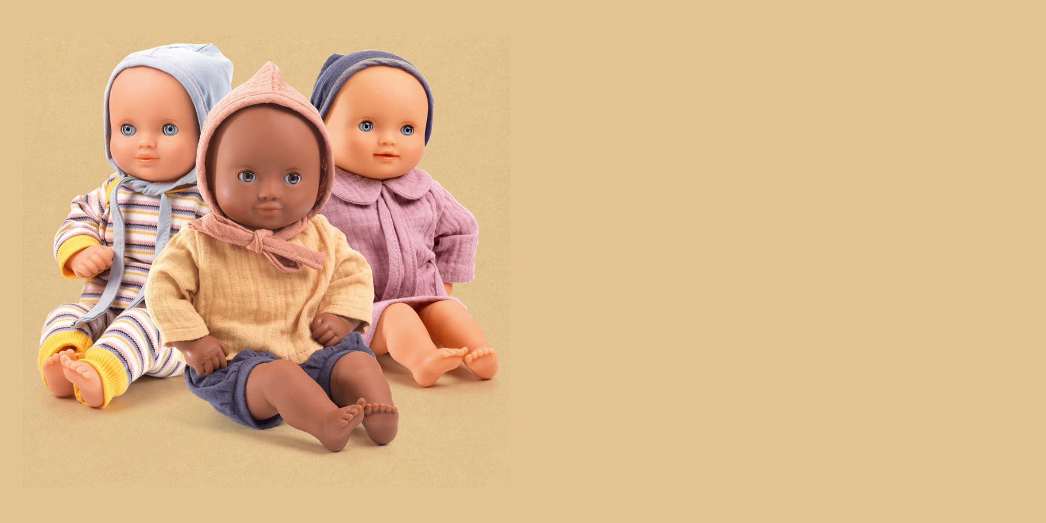Three djeco pomea dolls with different skin tones wearing colorful outfits on a beige background