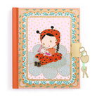 Notebook with a ladybug design and decorative elements on a white background