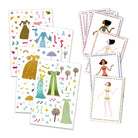Set of paper dolls with dresses and accessories on white background