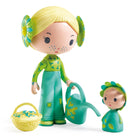 Toy figure of a girl with a smaller figure and accessories on a white background