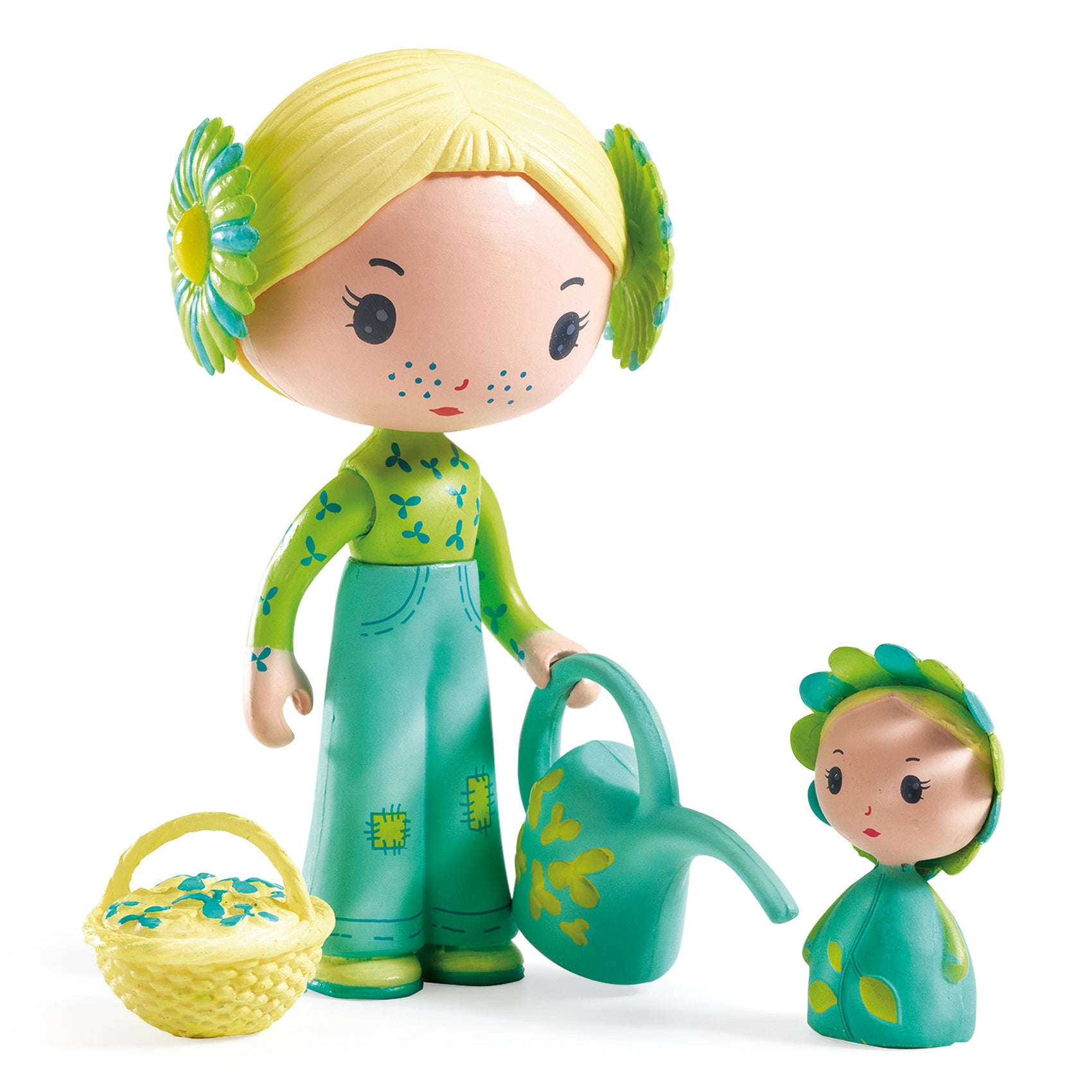 Toy figure of a girl with a smaller figure and accessories on a white background