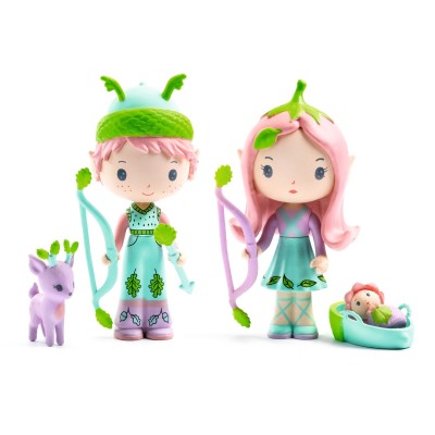 Two characters with green hair and accessories, standing next to a small purple creature and a baby in a green crib.