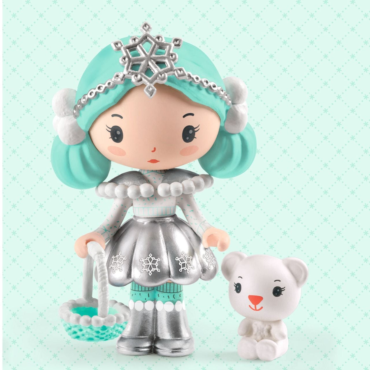 Toy figure with turquoise hair and silver outfit standing next to a small white bear-like creature on a light blue background.