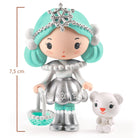 Toy figure with turquoise hair and silver outfit holding a small white dog, with dimensions indicated.