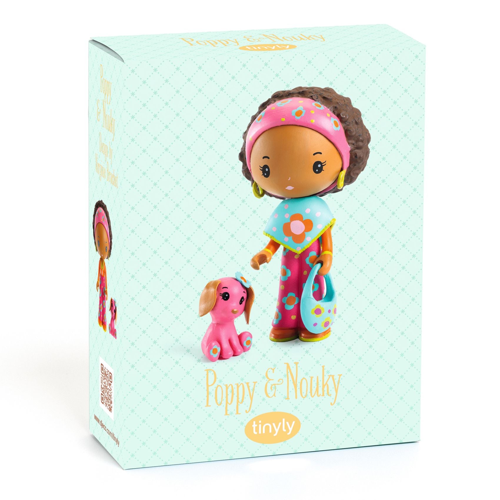 Box packaging of a toy figure with a pink headband and dog, featuring the brand 'tinyly'.