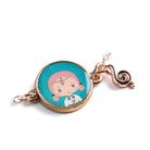 Jewelry charm with a character design on a white background
