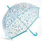 Transparent children's umbrella with colorful unicorn pattern on a white background