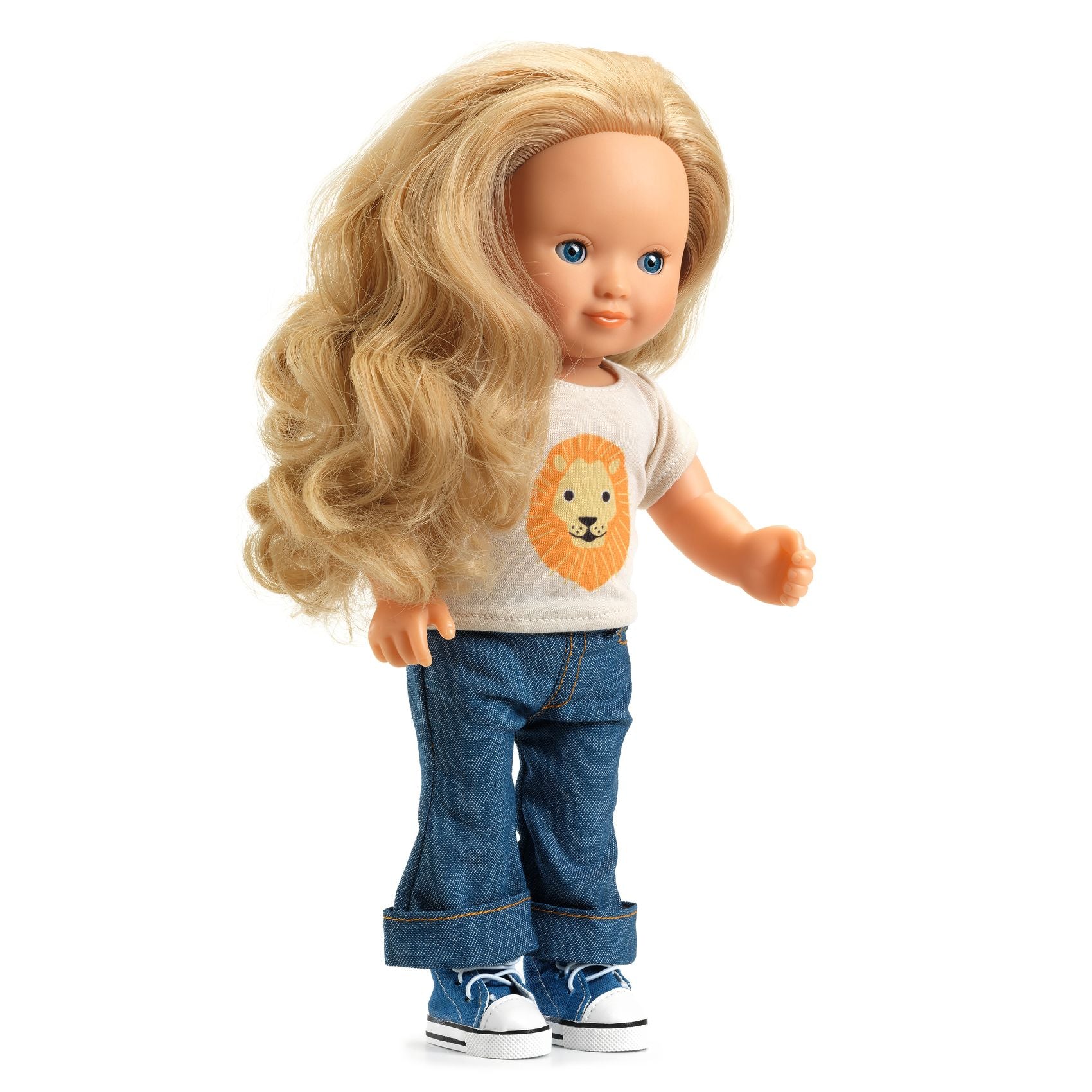 Doll with blonde hair wearing a t-shirt with a lion graphic and blue jeans on a white background