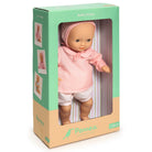 Pompea Baby Rose doll in packaging with a pink outfit and bonnet.