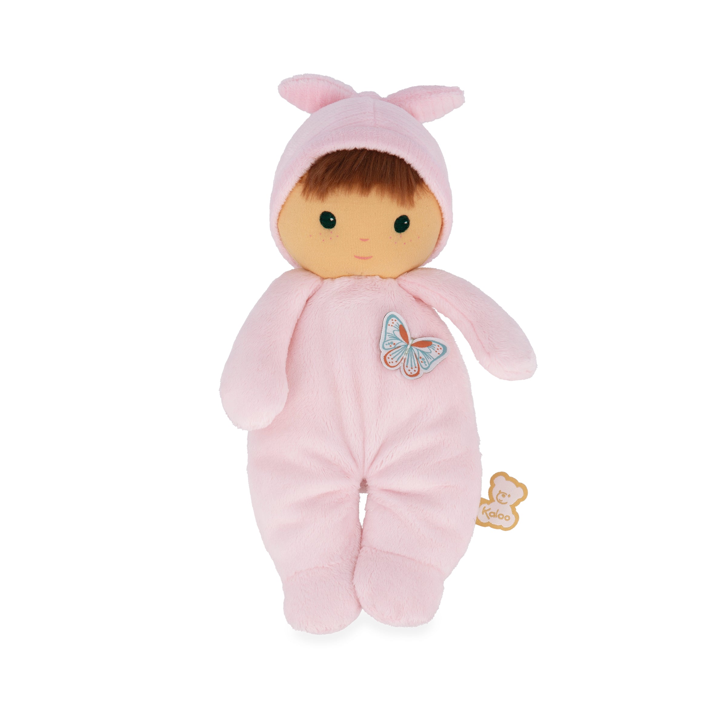 Plush toy baby doll in a pink outfit with butterfly design on a white background