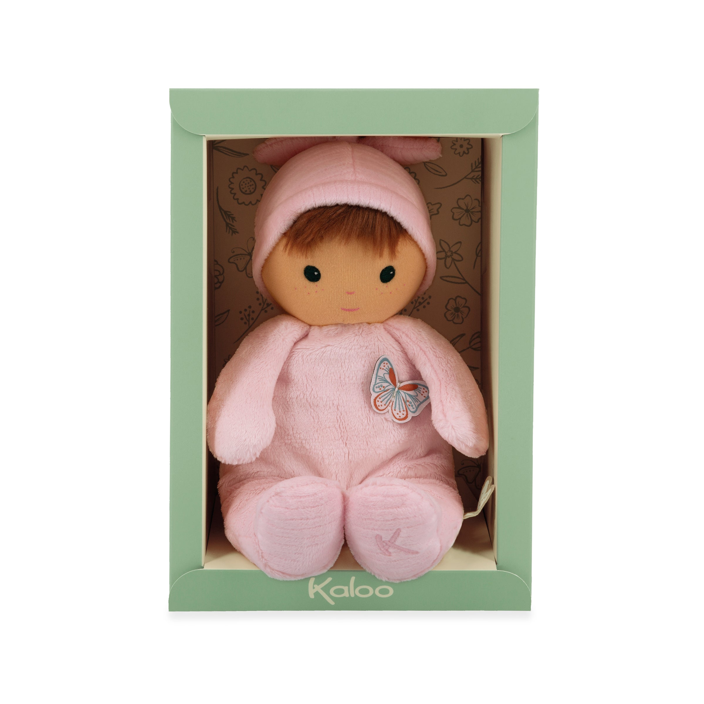 Pink doll with a butterfly design in a green box, featuring the brand 'Kaloo'.