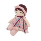 Stuffed doll with a pink dress and headband on a white background