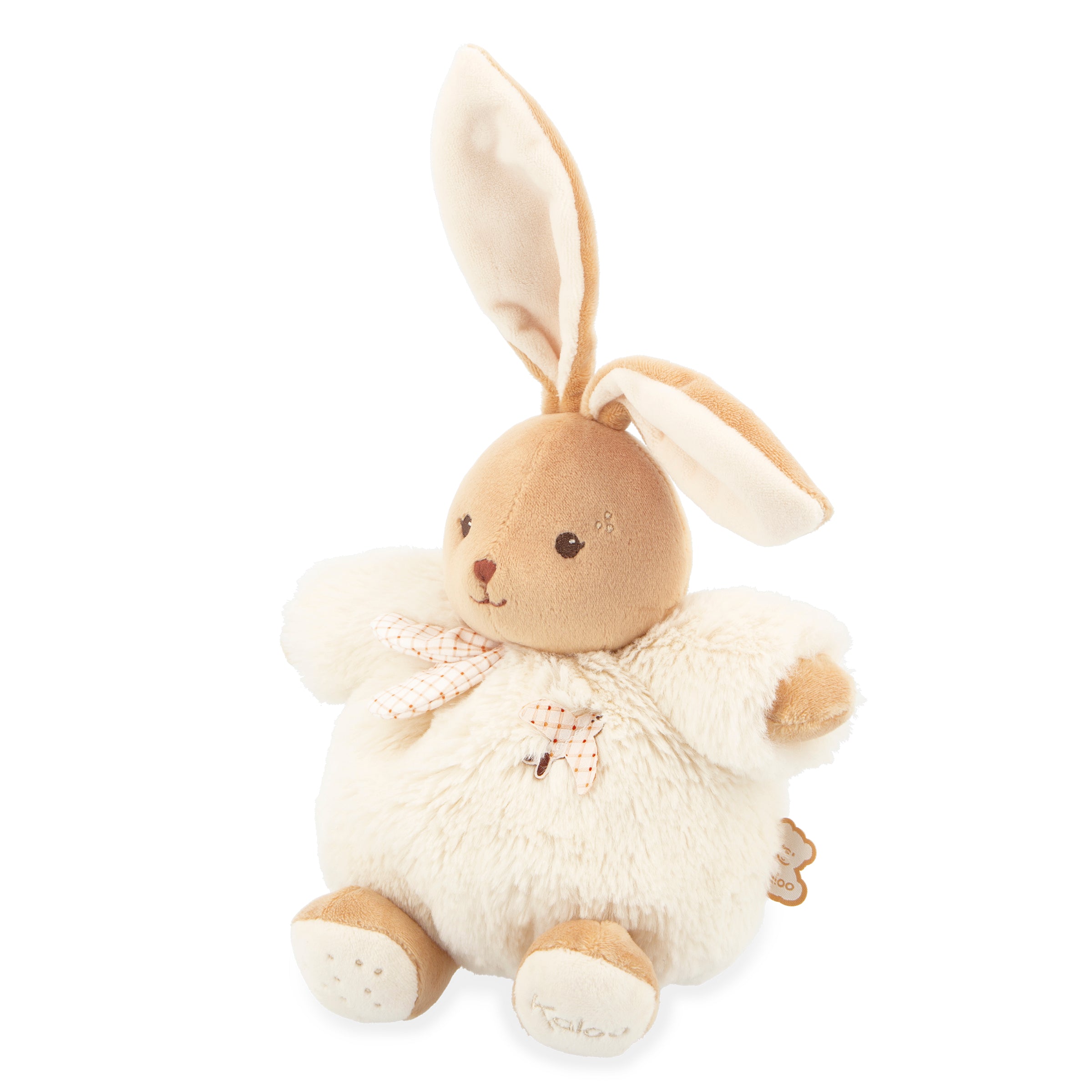 Plush toy rabbit with a white dress on a white background
