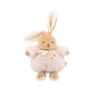 Plush toy rabbit with a pink outfit on a white background