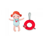 bath toy with red hair and a baby bib, next to a red float ring with a crab design on a white background.