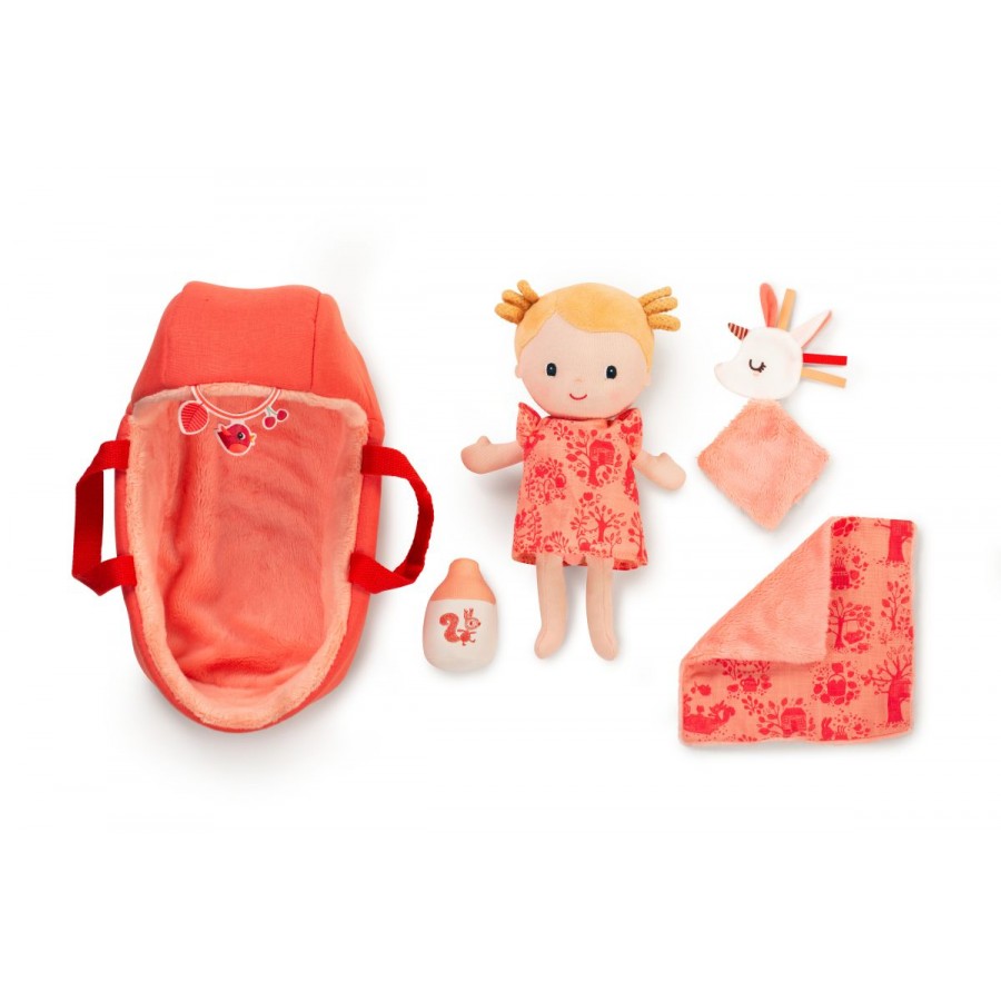 Set of toys including a doll, baby buggy, and soft toy on a white background