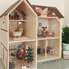 Wooden dollhouse with miniature furniture and decorations for christmas featuring the brand 'YOYO&FLO'.