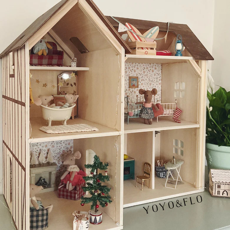 Wooden dollhouse with miniature furniture and decorations for christmas featuring the brand 'YOYO&FLO'.