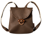A small brown pebbled leather mini backpack with a flap closure and a wooden toggle clasp, shown against a plain white background.