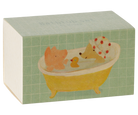 A rectangular product box for a 'Bath Tub Set' by Maileg, featuring a light green tiled pattern and an illustration of a yellow bathtub with a pink pig, a yellow duck, and a beige dog wearing a red-and-white polka dot bath cap.