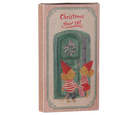 A vintage-style illustrated box labeled 'Christmas door set' with two small mouse figures standing in front of a green door, shown on a plain white background.