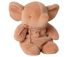 A soft plush elephant toy in a warm tan-brown color, sitting upright against a plain white background. It has large floppy ears, a small stitched face, and a matching fabric bow tied around its neck.