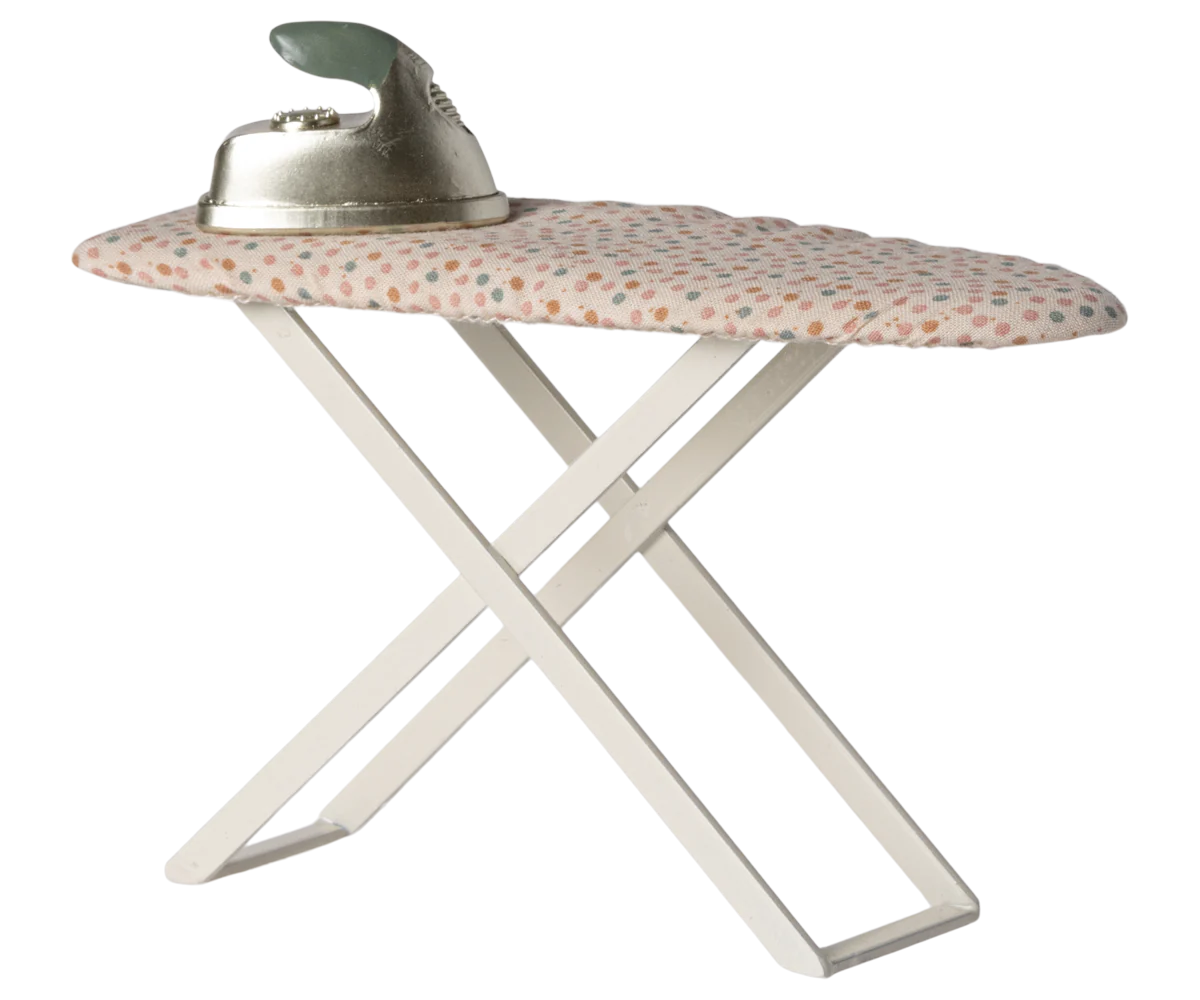 A miniature metal and fabric ironing board with a vintage style iron, suitable for dollhouses, designed for Maileg mice.