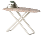 A miniature metal and fabric ironing board with a vintage style iron, suitable for dollhouses, designed for Maileg mice.