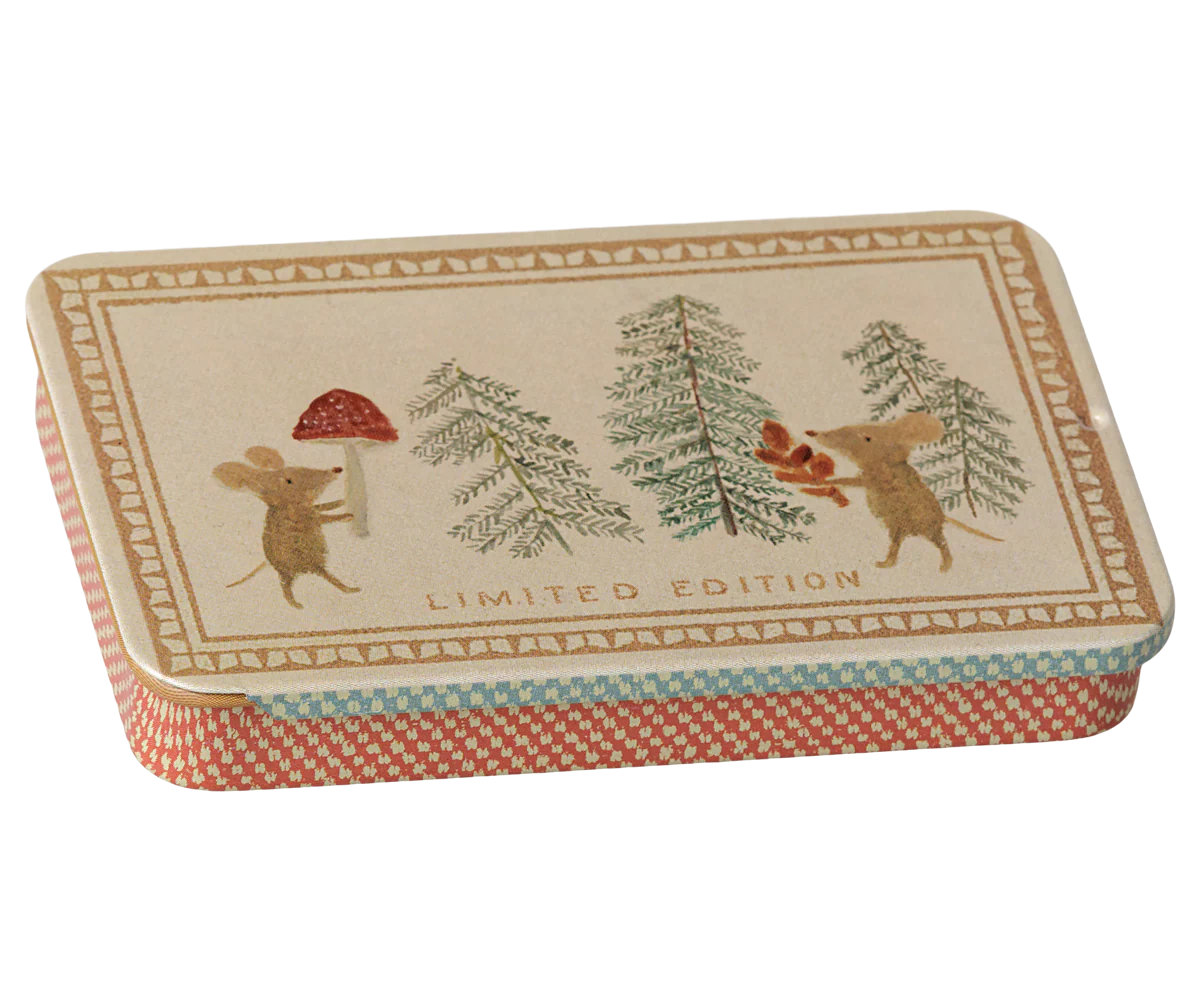 A rectangular metal tin with rounded corners, featuring a vintage-style illustration of two small mice among pine trees and a red mushroom on the lid, with 'LIMITED EDITION' printed below. The tin has a cream background with a patterned border and a red, beige, and light blue patterned base.