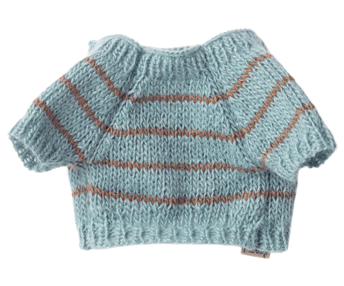 Knitted sweater with striped pattern on a white background