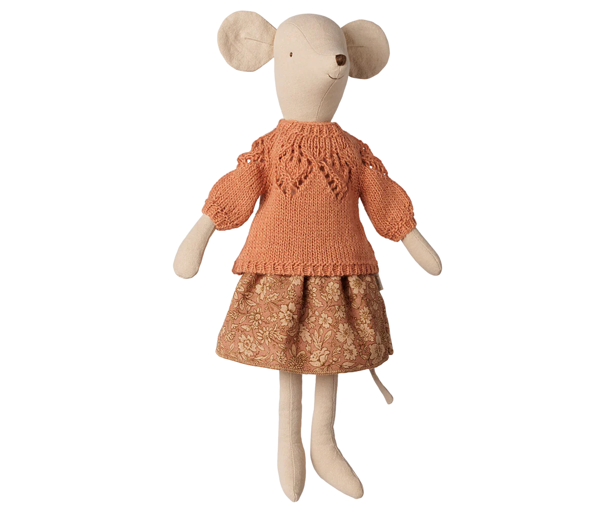 A plush mouse doll with beige fabric skin and ears, wearing a knitted orange sweater and a patterned orange-brown skirt, shown against a plain white background.