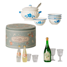 A Maileg soup and drink set displayed on a white background, including a round tin canister, a cream-colored soup pot with blue floral accents and a spoon, several matching soup bowls, two small bottles, and three drinking glasses.