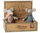 Two toy mice in a decorative cigar box with  Maileg branding.