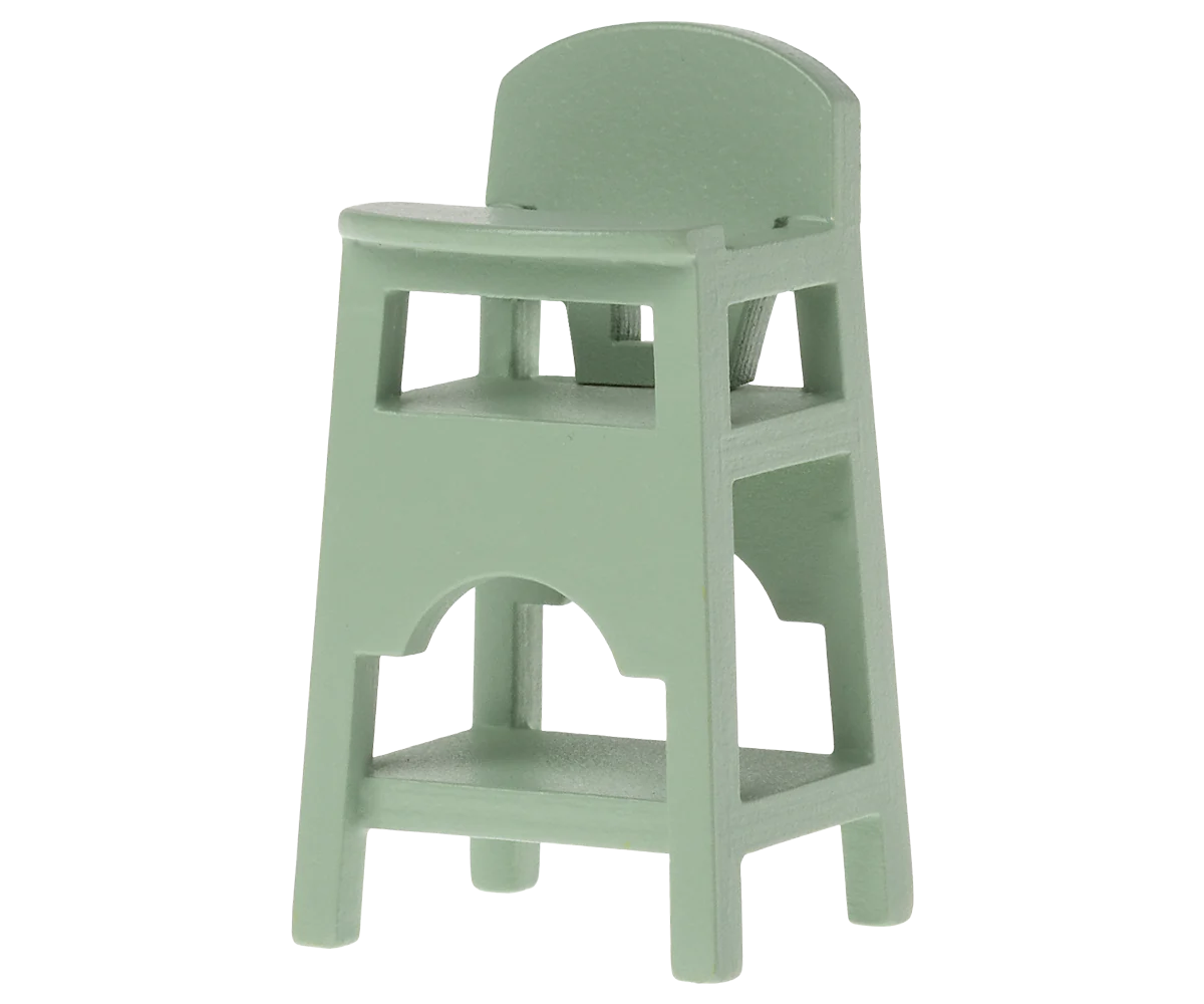 A small, mint green high chair designed for doll house figures, specifically baby mice and My rabbits.