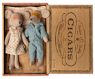 Two Maileg mice, a mum in a dress and a dad in pyjamas, inside an open cigar box with decorative text.