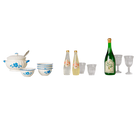 A miniature dollhouse-scale kitchen and bar set featuring a white ceramic soup pot and bowls with blue floral patterns, two clear bottles with pink floral labels, a green bottle labeled 'Berry', and several clear drinking glasses, all arranged on a plain white background.