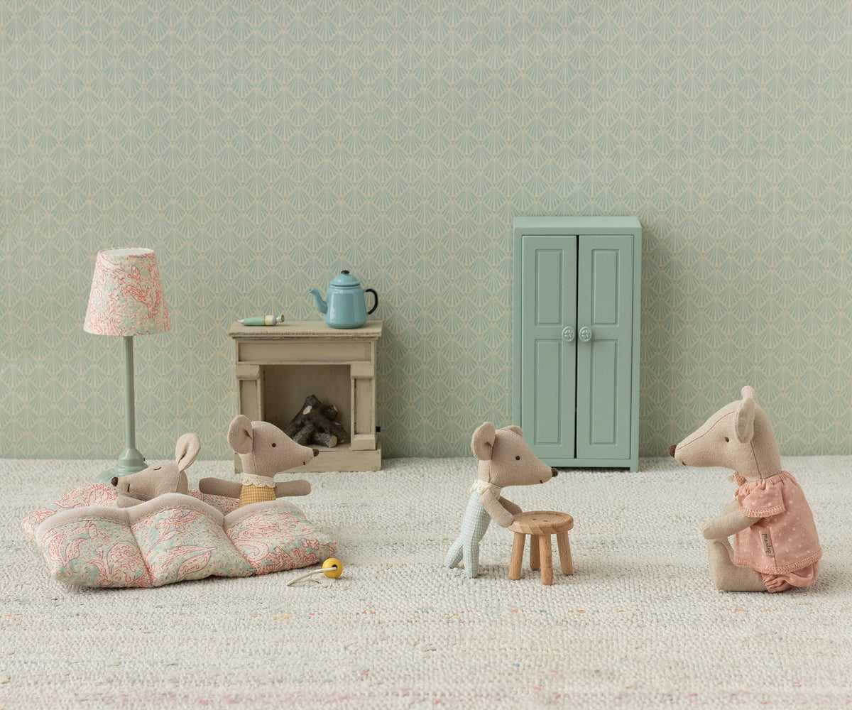 Maileg triplets new version one sleeping mouse figures in a room with furniture and decor.
