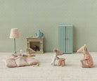 Maileg triplets new version one sleeping mouse figures in a room with furniture and decor.