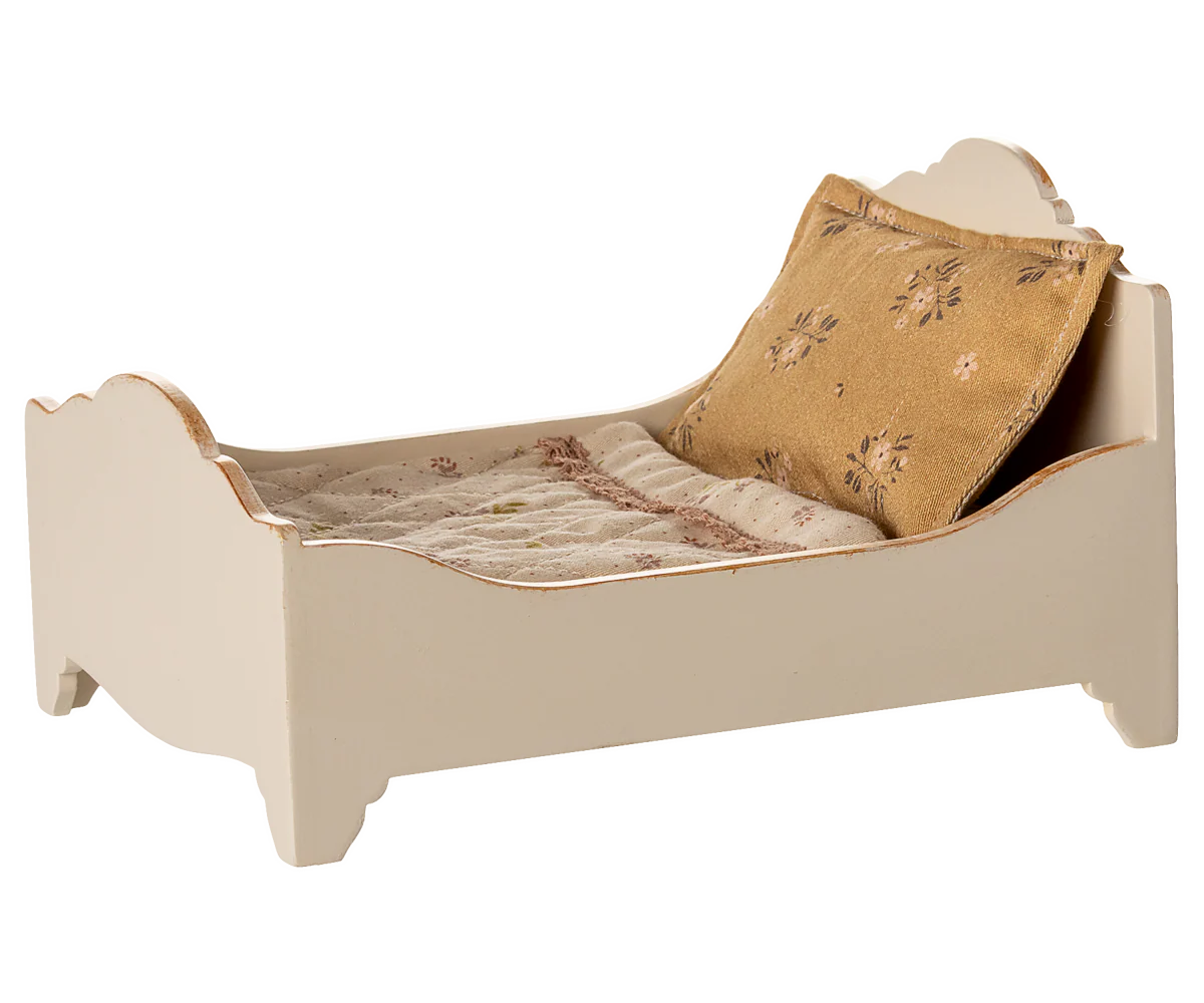 Maileg vintage wooden double bed with bedding and a pillow on a white background