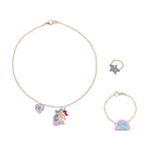 Jewelry set with unicorn pendant, heart charm, star ring, and rainbow bracelet on a white background