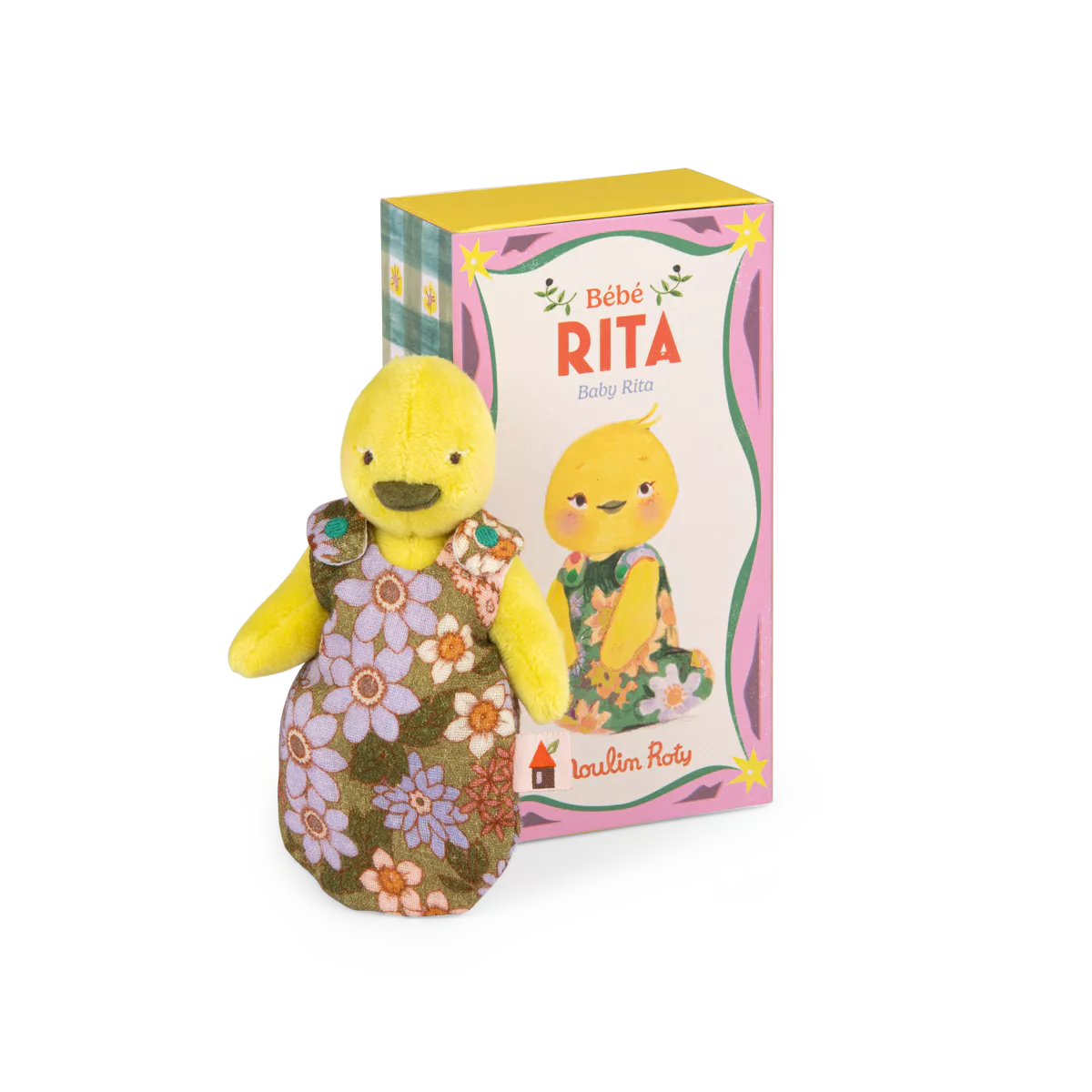 Moulin roty baby rita duck Yellow plush toy with a floral dress next to its packaging on a white background