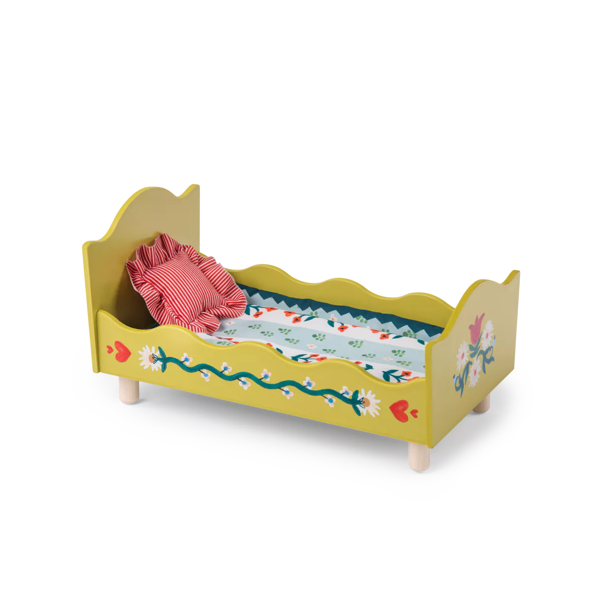 Yellow doll bed with floral design and pink pillow on a white background