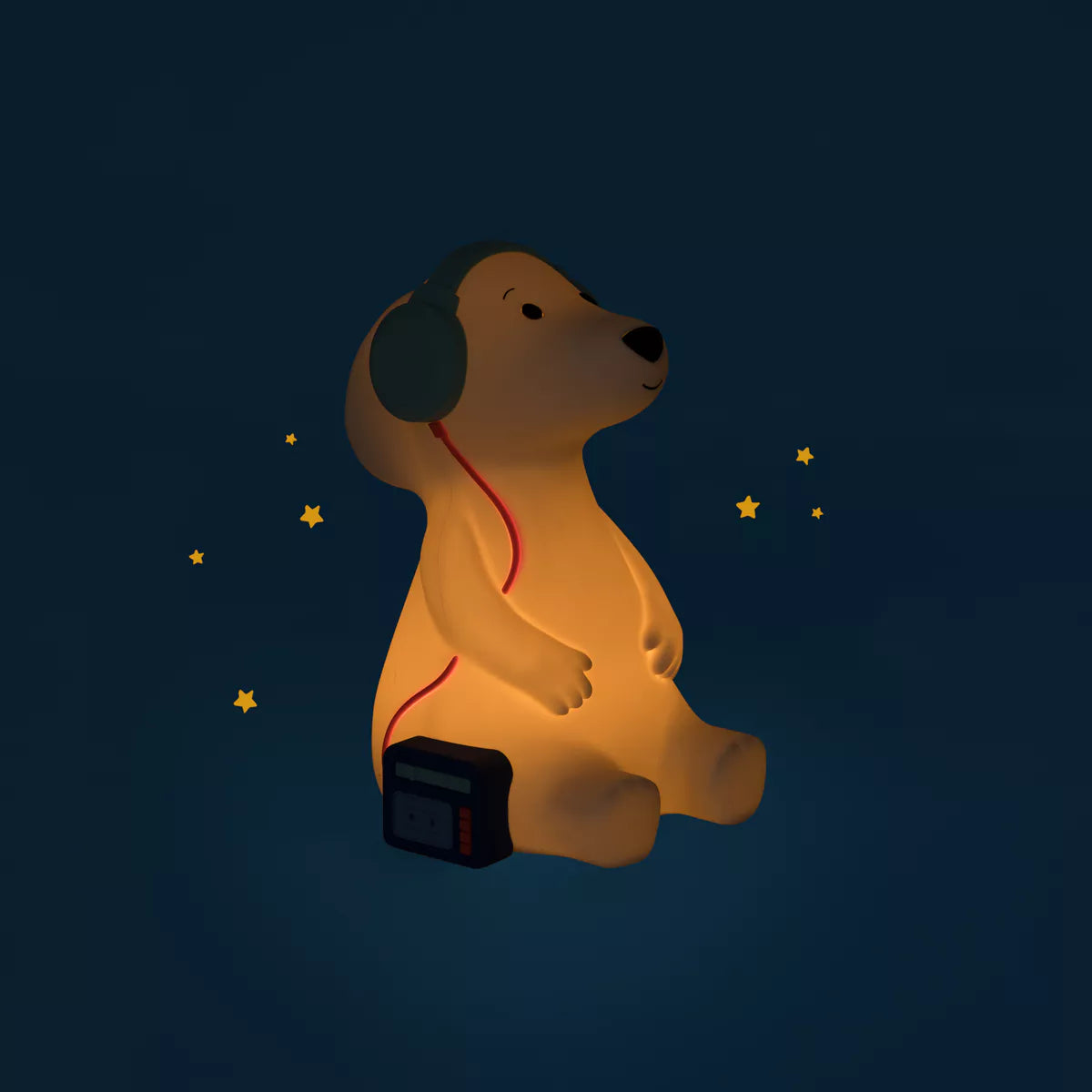 Dog-shaped night light with headphones on a dark blue background