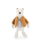 A plush polar bear toy wearing a mustard yellow corduroy jacket, standing against a solid white background.