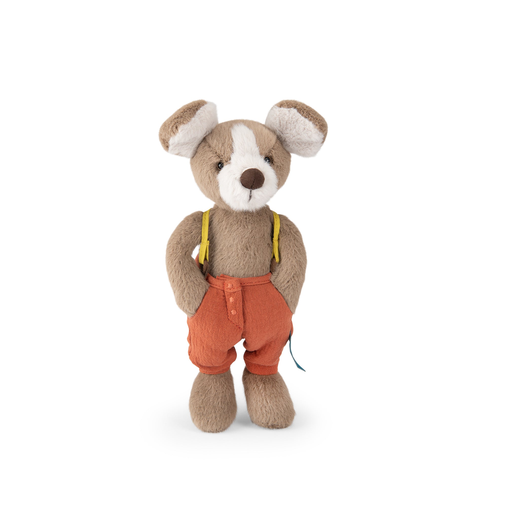 A plush teddy bear toy with brown and white fur, wearing orange shorts and yellow suspenders, standing against a plain white background.