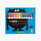 Box of brush markers with colorful caps on a blue background