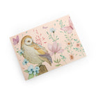 Card with a bird and floral design on a white background