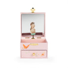 Pink jewelry box with a figurine inside on a white background