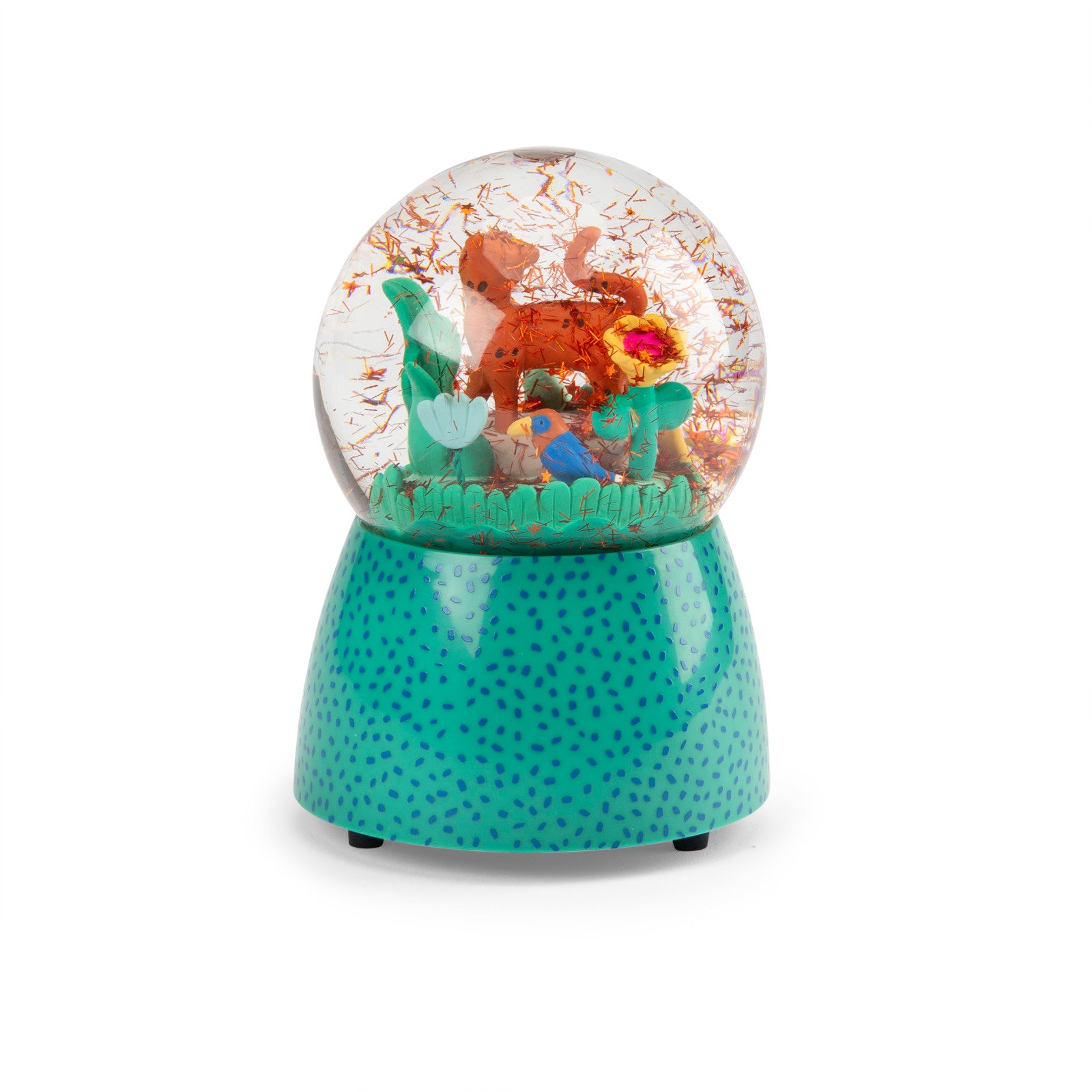Decorative snow globe with figurines on a white background