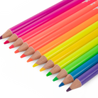 Set of colorful pencils arranged in a rainbow pattern on a white background